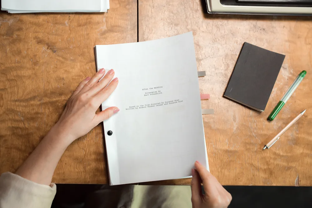 Working documents and notes on a desk, with no confidential data